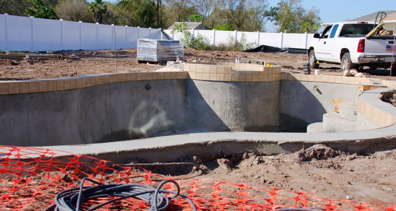 Excavated in-ground swimming pool under construction